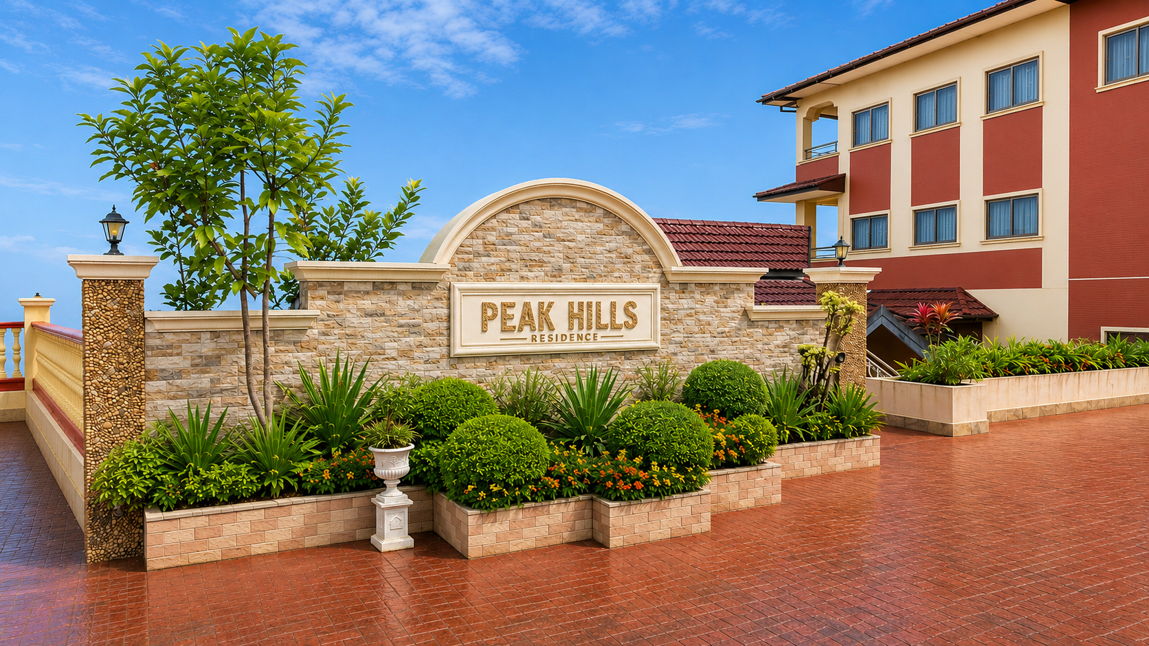 The stone entrance sign of Peak Hills Residence in daylight